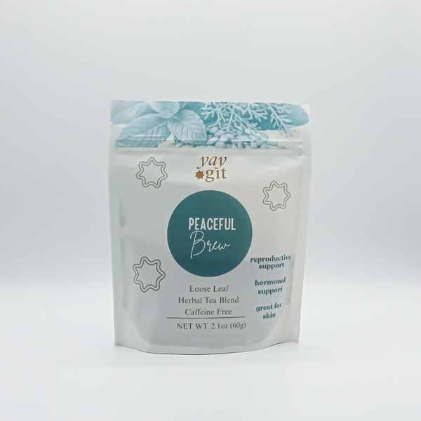 Tea package labeled 'Peaceful Brew' with decorative elements on a white background