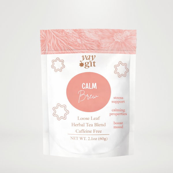 Tea package labeled 'Calm Brew' with a pink label on a white background